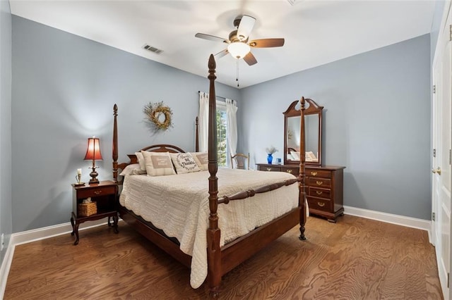 1125 Fairview Club Cir, Dacula, GA 30019 - bedroom with wood finished floors and a ceiling fan