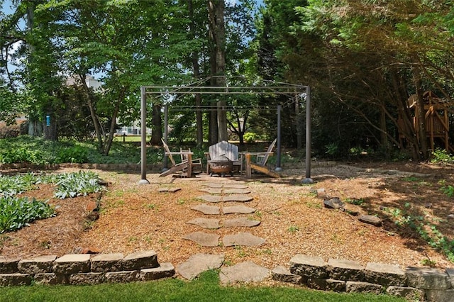 1125 Fairview Club Cir, Dacula, GA 30019 - view of yard featuring a gazebo and a fire pit