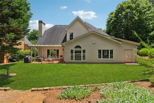 1125 Fairview Club Cir, Dacula, GA 30019 - back of house with a chimney, a lawn, a shingled roof, and a patio area