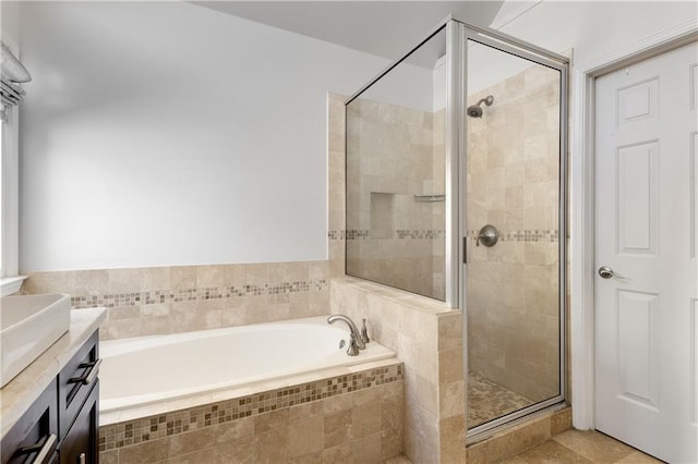 4679 Glenshire Pl, Dunwoody, GA 30338 - full bath with a stall shower, a garden tub, tile patterned floors, and vanity
