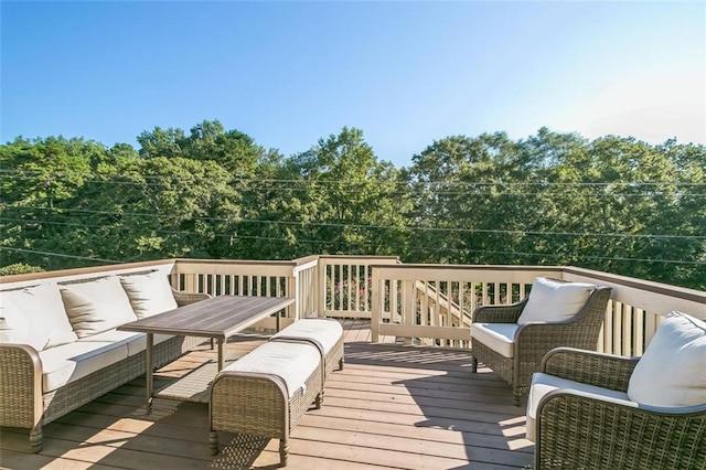 deck featuring outdoor lounge area