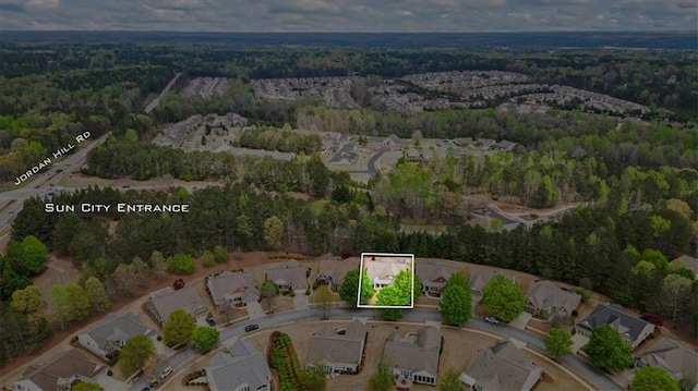 218 Begonia Ct, Griffin, GA 30223 - aerial view of property and surrounding area featuring property parcel outlined and nearby suburban area