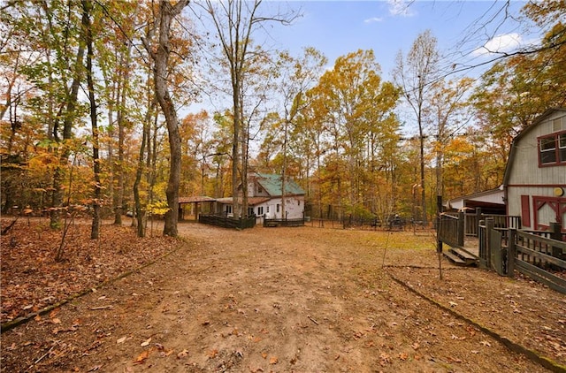 view of yard featuring a wooden deck