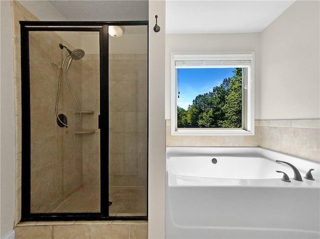 bathroom featuring plus walk in shower