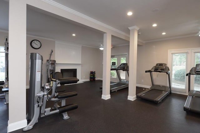 workout area with decorative columns, baseboards, crown molding, and recessed lighting