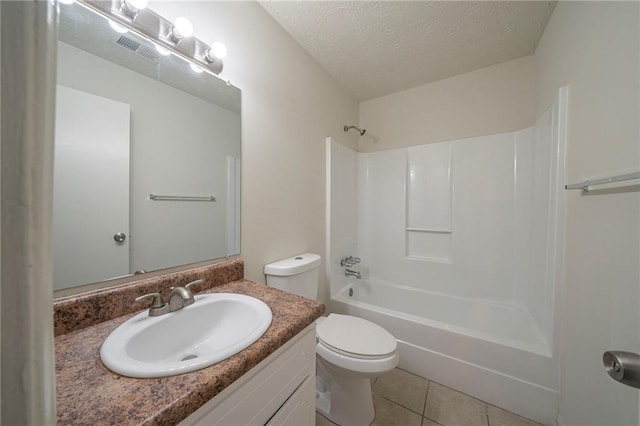 full bathroom featuring toilet, a textured ceiling, shower / bathtub combination, vanity, and tile patterned flooring