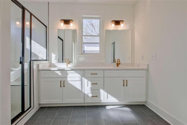 bathroom with vanity and walk in shower