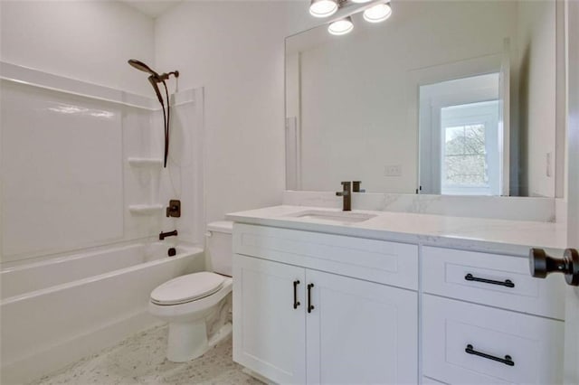 full bathroom featuring vanity, tub / shower combination, and toilet