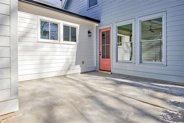 doorway to property with a patio