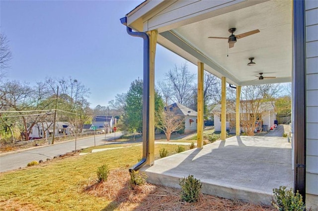 view of patio / terrace featuring ceiling fan