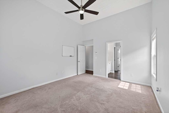 563 Bailey Dr, Jefferson, GA 30549 - unfurnished bedroom with high vaulted ceiling, carpet flooring, ensuite bathroom, and a ceiling fan