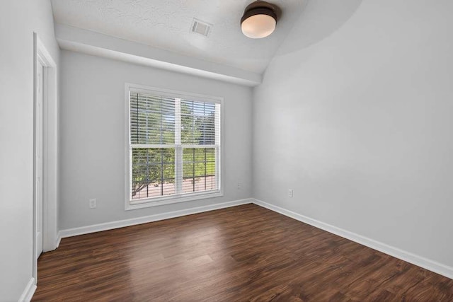 563 Bailey Dr, Jefferson, GA 30549 - unfurnished room featuring dark wood-type flooring and lofted ceiling