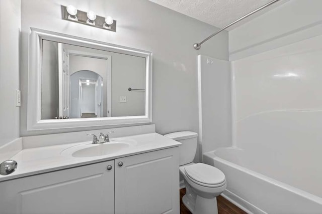 563 Bailey Dr, Jefferson, GA 30549 - full bathroom with vanity, shower / tub combination, and a textured ceiling