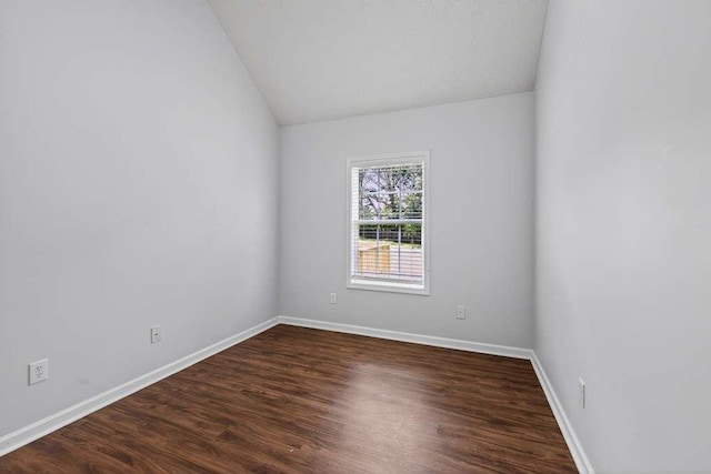 563 Bailey Dr, Jefferson, GA 30549 - empty room with lofted ceiling and dark wood finished floors