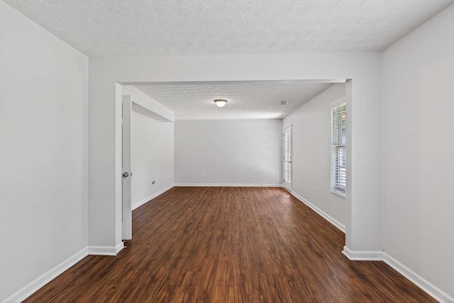 563 Bailey Dr, Jefferson, GA 30549 - spare room featuring dark wood-style flooring
