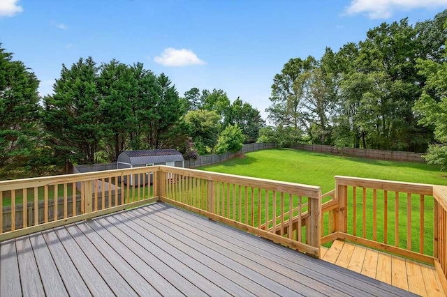 563 Bailey Dr, Jefferson, GA 30549 - deck featuring a shed, a fenced backyard, and view of wooded area
