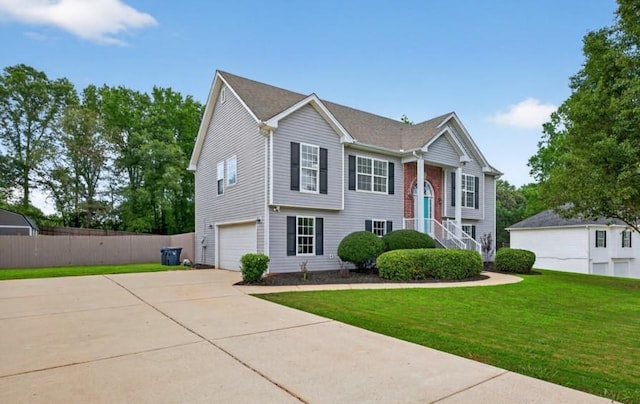563 Bailey Dr, Jefferson, GA 30549 - bi-level home with driveway and an attached garage