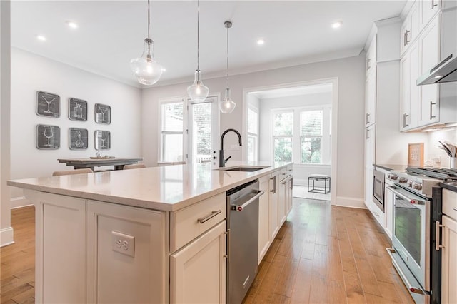 1964 Attell Way, Decatur, GA 30033 - kitchen featuring stainless steel appliances, a sink, plenty of natural light, a kitchen island with sink, and recessed lighting