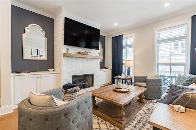 1964 Attell Way, Decatur, GA 30033 - living room with crown molding, a brick fireplace, light wood finished floors, and recessed lighting