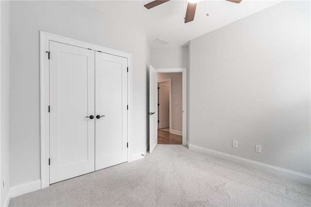 1964 Attell Way, Decatur, GA 30033 - unfurnished bedroom with carpet floors, baseboards, a closet, and a ceiling fan