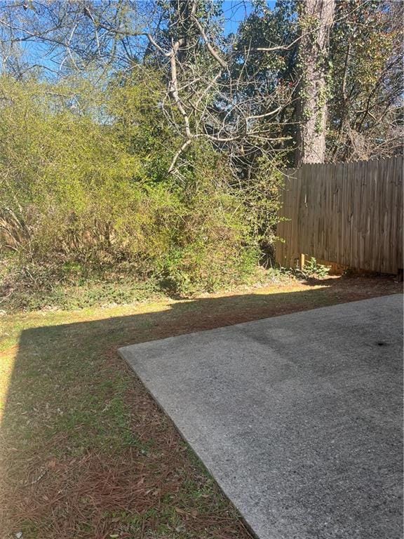 view of yard with fence