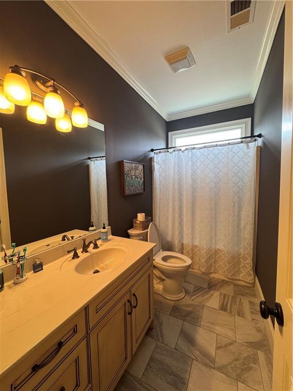 bedroom with visible vents, light colored carpet, crown molding, and ceiling fan