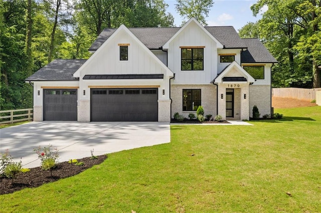 1870 Twin Branch Dr, Marietta, GA 30062 - modern inspired farmhouse featuring concrete driveway, board and batten siding, an attached garage, brick siding, and a shingled roof