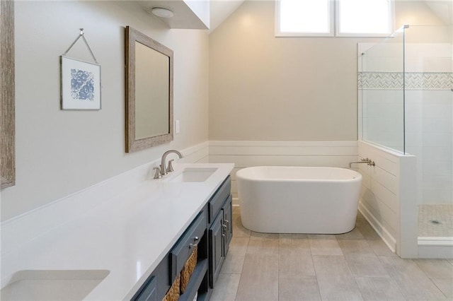 4130 Providnce Sq, Alpharetta, GA 30009 - bathroom with tiled shower, double vanity, a freestanding tub, and tile patterned flooring