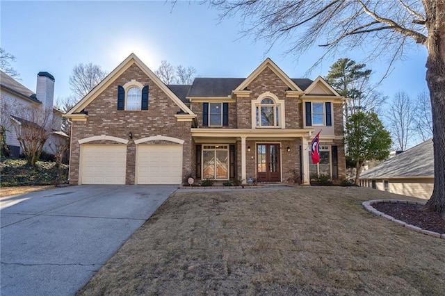 front facade with a garage, a front lawn, and a porch