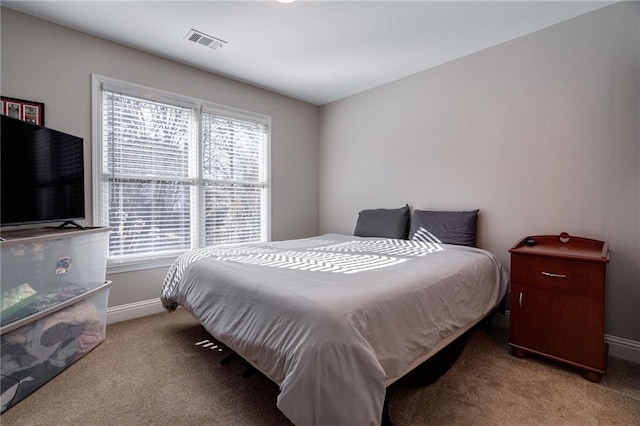 bedroom with light carpet