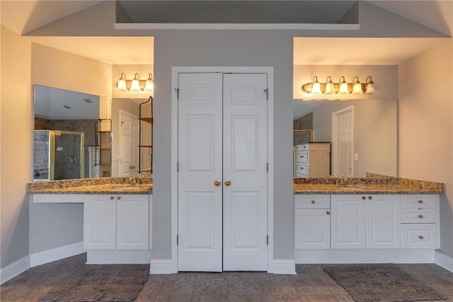 bathroom with vanity and an enclosed shower