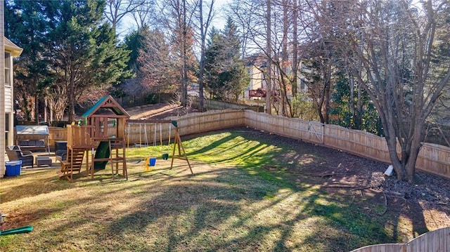 view of yard with a playground