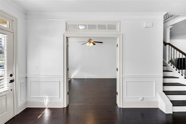 908 Rainsong Ct, Braselton, GA 30517 - entrance foyer with a ceiling fan, wood finished floors, stairs, and crown molding