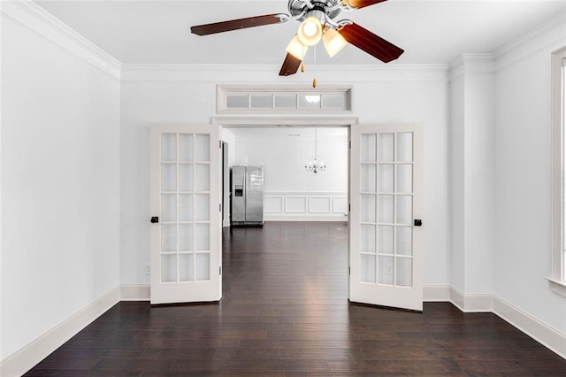 908 Rainsong Ct, Braselton, GA 30517 - unfurnished room featuring french doors, crown molding, dark wood-style floors, ceiling fan, and a chandelier