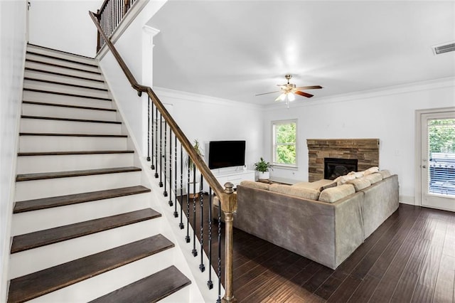 908 Rainsong Ct, Braselton, GA 30517 - living area with ceiling fan, a fireplace, healthy amount of natural light, stairs, and crown molding