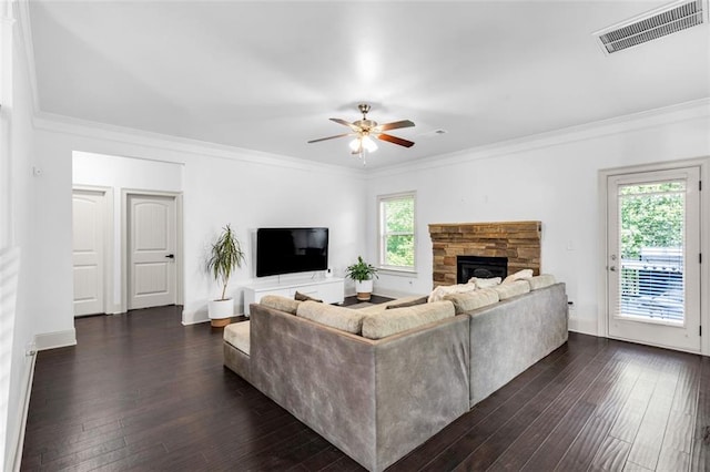 908 Rainsong Ct, Braselton, GA 30517 - living room featuring a fireplace, a ceiling fan, dark wood-style flooring, and ornamental molding