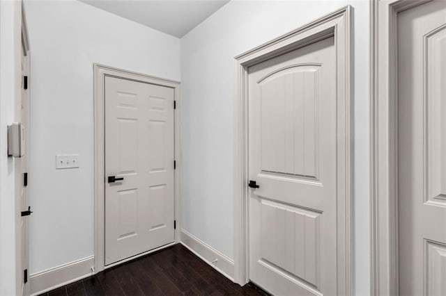 908 Rainsong Ct, Braselton, GA 30517 - corridor with dark wood-style flooring and baseboards