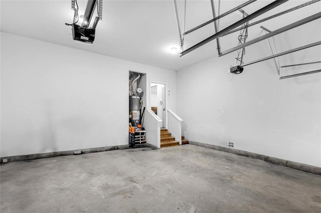 908 Rainsong Ct, Braselton, GA 30517 - garage featuring water heater and a garage door opener