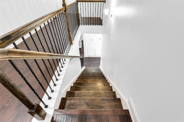 908 Rainsong Ct, Braselton, GA 30517 - stairway featuring wood finished floors