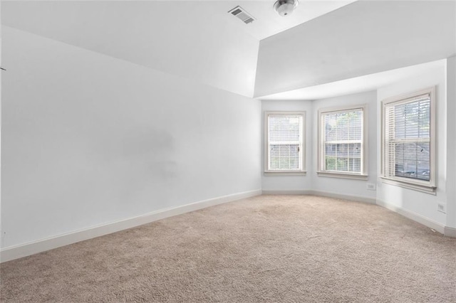 908 Rainsong Ct, Braselton, GA 30517 - carpeted empty room featuring baseboards and lofted ceiling