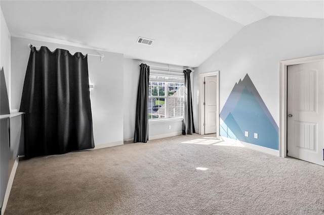 908 Rainsong Ct, Braselton, GA 30517 - carpeted empty room with lofted ceiling and baseboards