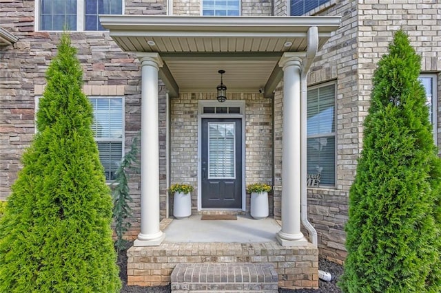 908 Rainsong Ct, Braselton, GA 30517 - view of exterior entry with covered porch