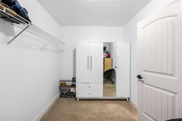 908 Rainsong Ct, Braselton, GA 30517 - walk in closet with carpet flooring