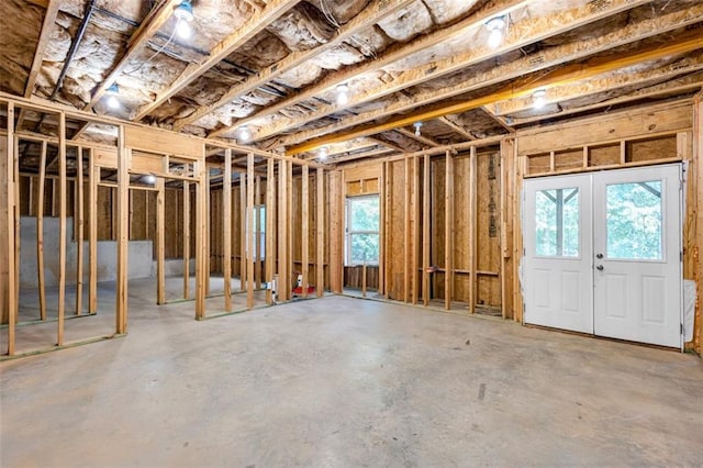 908 Rainsong Ct, Braselton, GA 30517 - misc room featuring concrete floors and french doors
