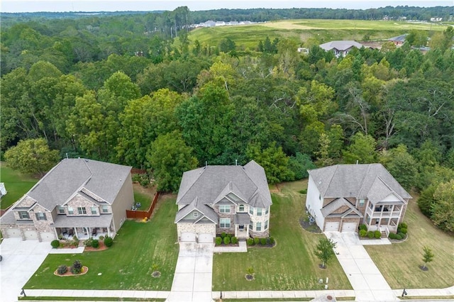 908 Rainsong Ct, Braselton, GA 30517 - view of subject property with a forest