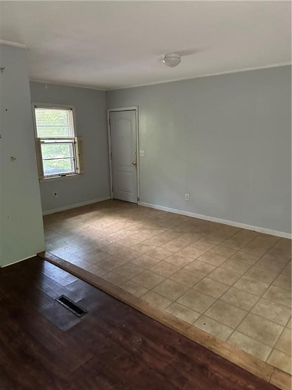 empty room with baseboards