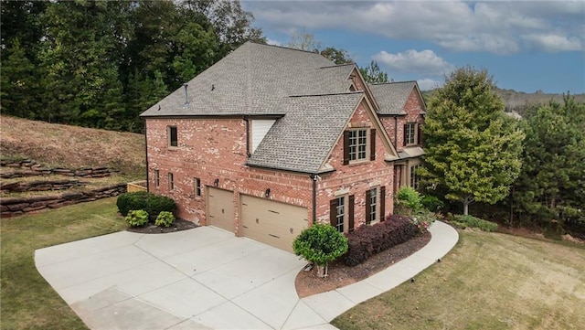 view of home's exterior with a yard and a garage