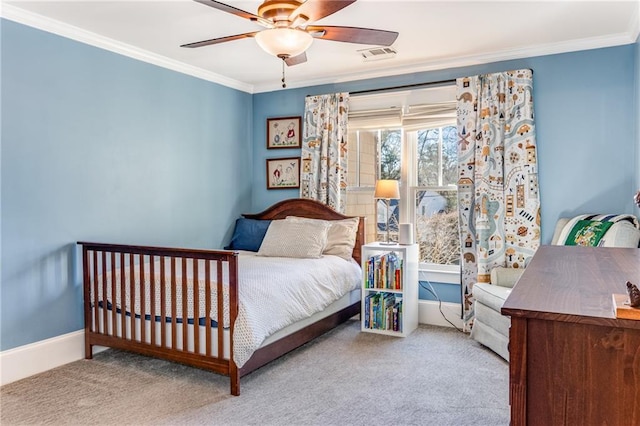 bedroom with crown molding, baseboards, visible vents, and carpet floors