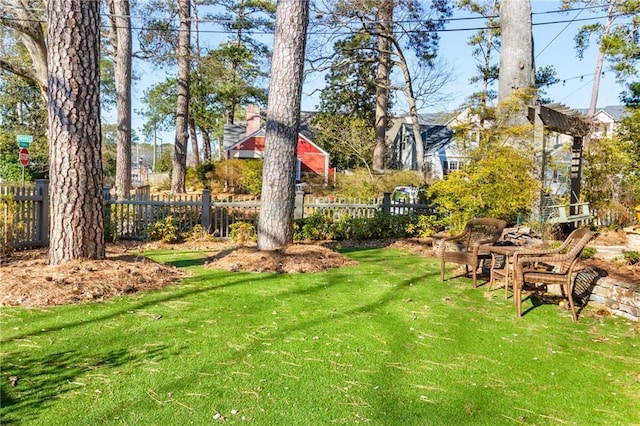 view of yard featuring fence