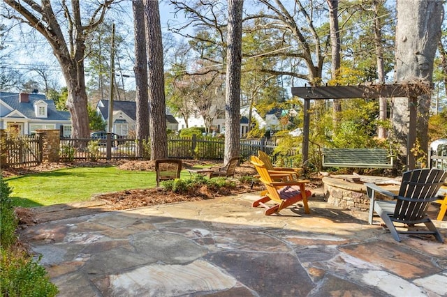 view of patio / terrace featuring fence